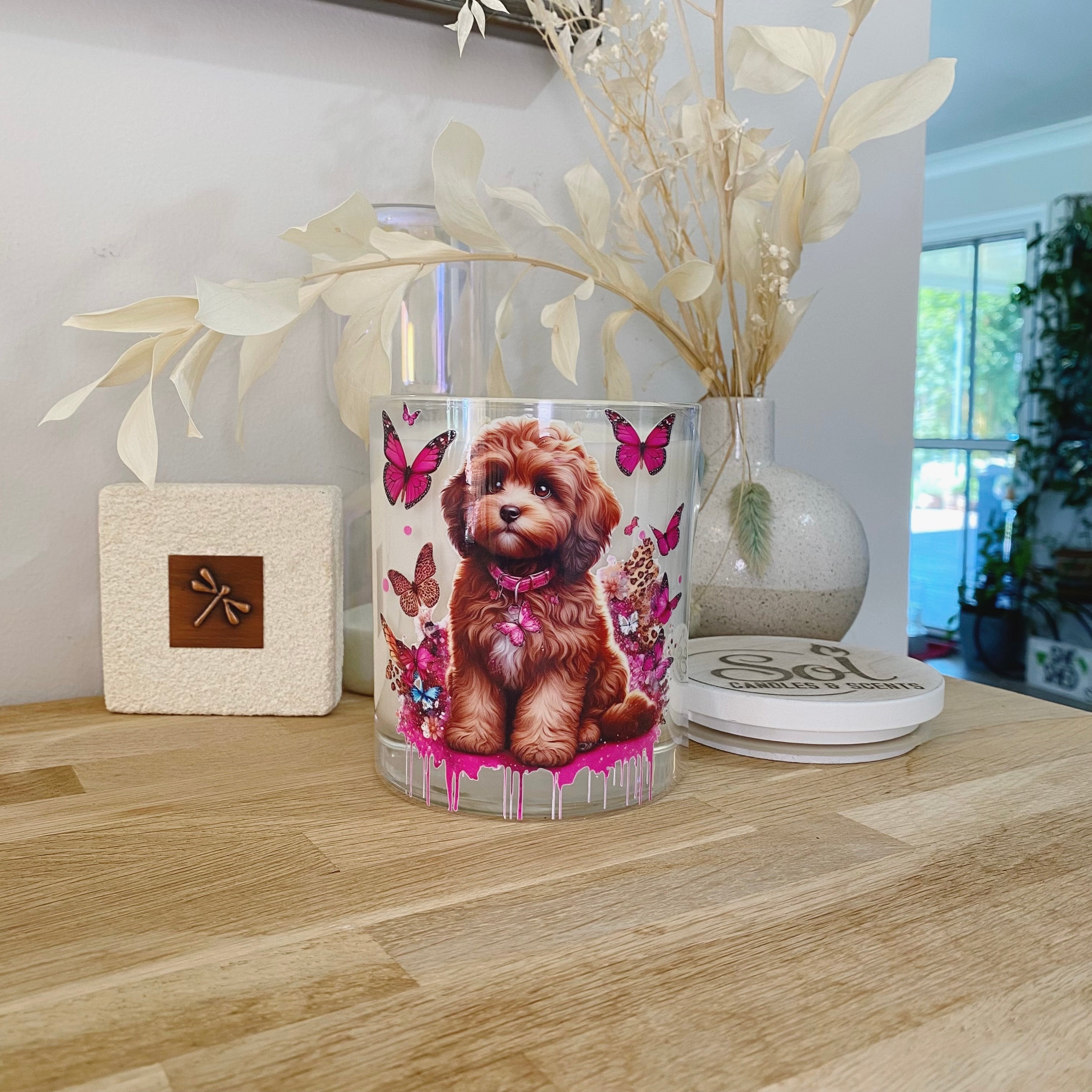 Cavoodle Chocolate Sitting Surrounded with Butterflies. Xlarge Candle_Sol Candles & Scents