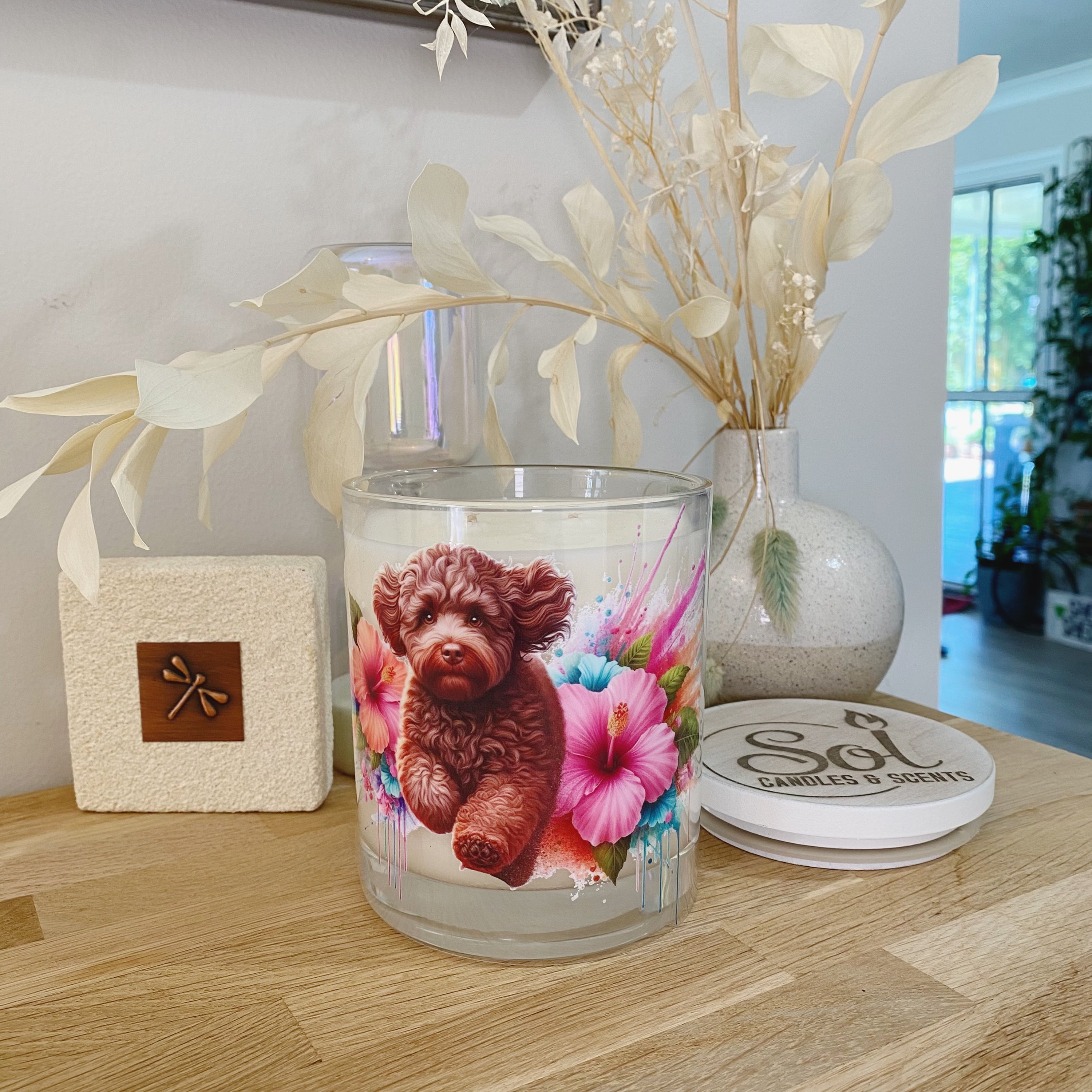 Xlarge Candle with a Chocolate Cavoodle dog and floral design. Sol Candles & Scents Design.
