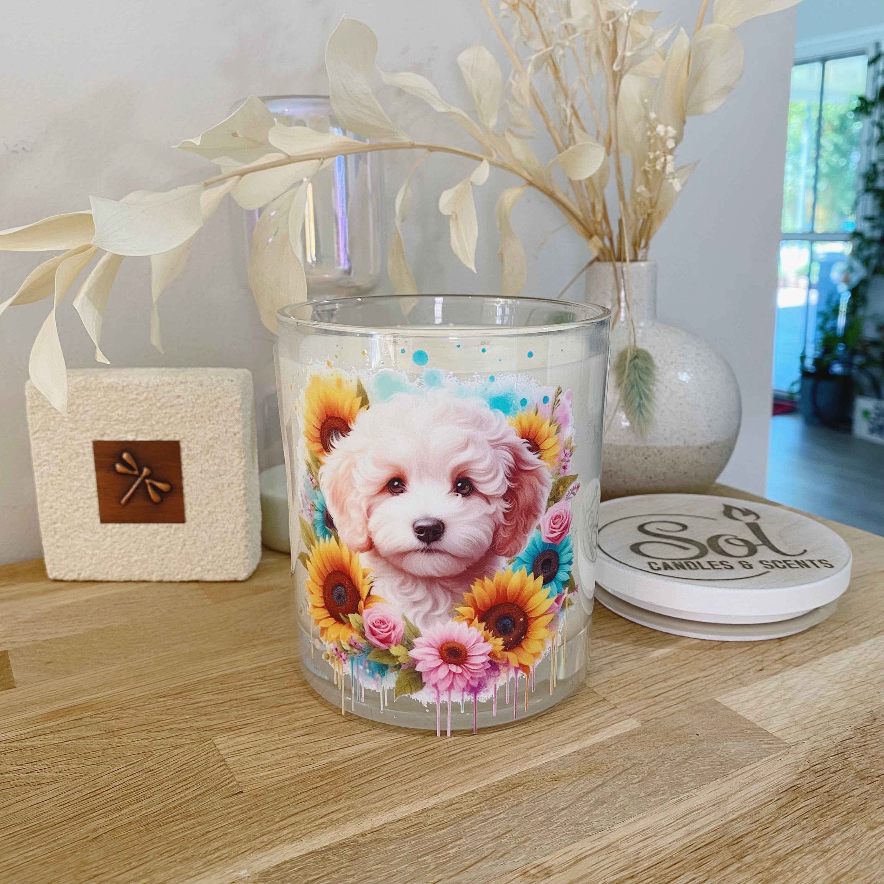 Soy Candle with a Cavoodle dog and floral design_ Made by Sol Candles & Scents