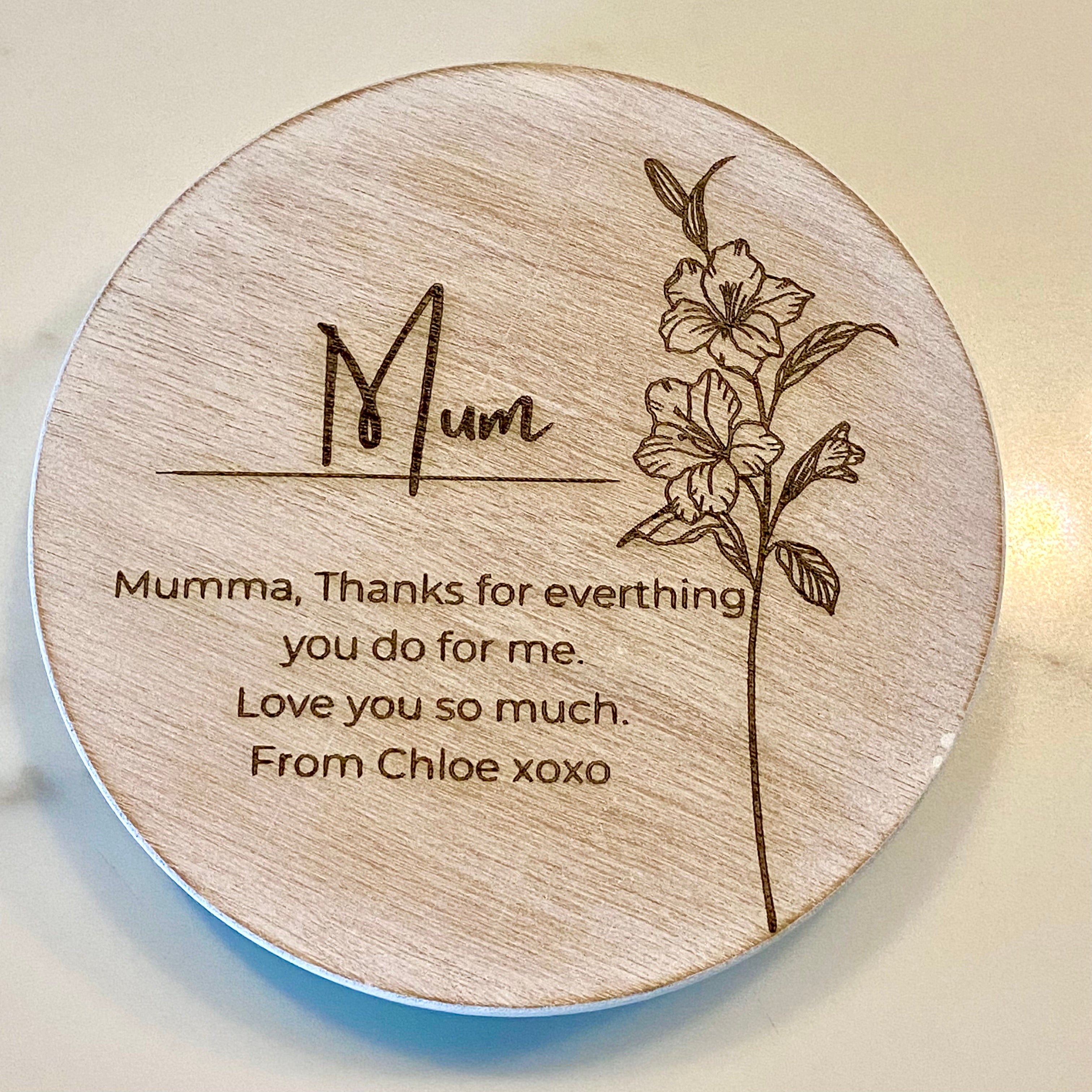 Wooden coaster with floral design and heartfelt message for Mum from Chloe.