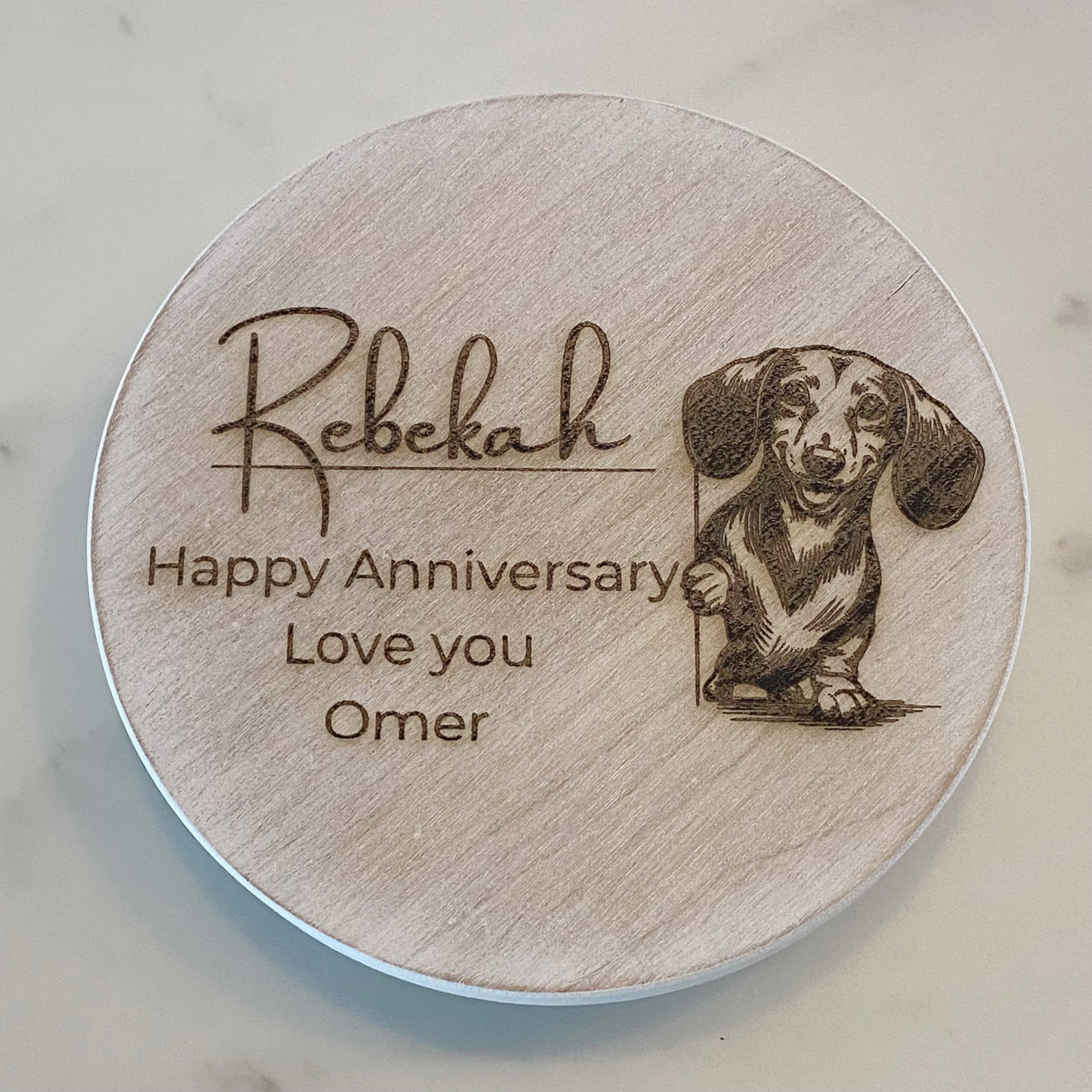 Engraved wooden coaster with a dog illustration, personalized message for Rebekah&