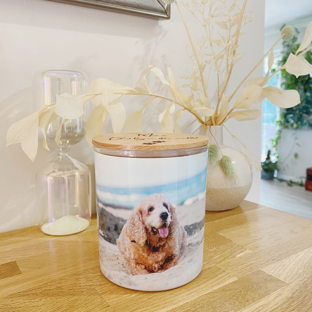 Personalised memorial candle with engraved pet message, paw print or flower