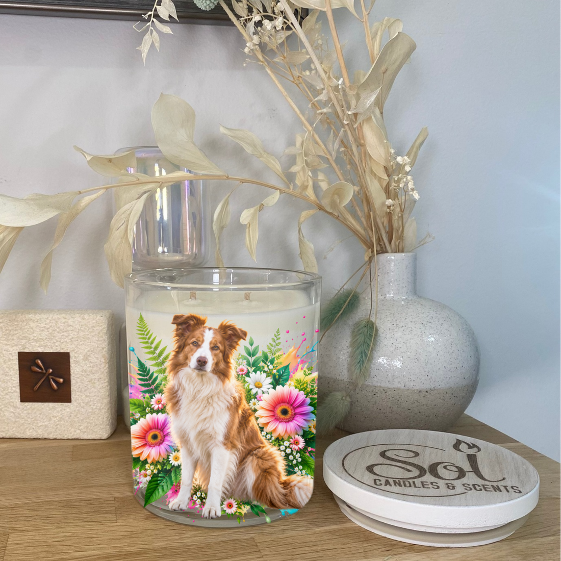 Border Collie Red Sitting with Bright Flowers placed onto a Soy Candle. Sol Candles &amp; Scents. 