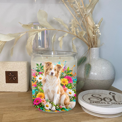 Border Collie Gold Sitting in Bright Flowers. Placed onto a Soy Candle. Sol Candles &amp; Scents.