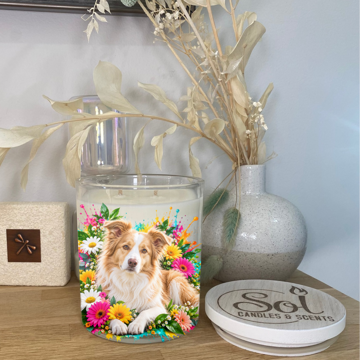 Border Collie Gold Dog Laying Down among flowers. Placed onto a Soy Candle. Sol Candles &amp; Scents.